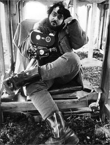  Photographer Dmitri Kasterine's favorite photo of Stanley Kubrick, featuring Kubrick taking a break, waiting for the rain to stop, during filming of "A Clockwork Orange."